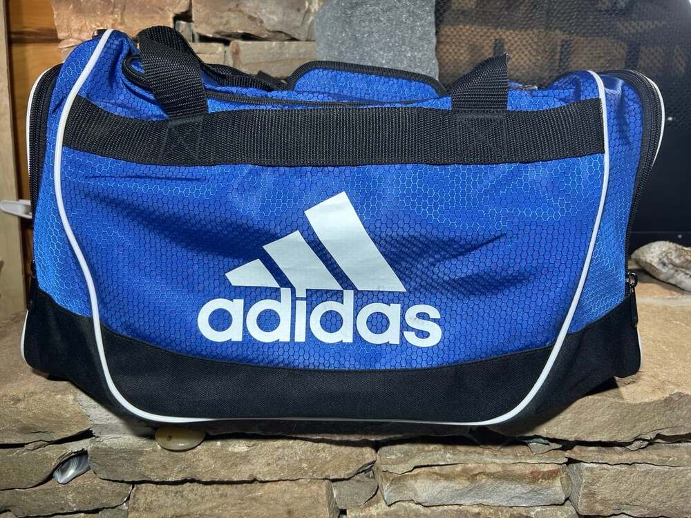 Adidas Blue and black duffel bag ( no shoulder strap)